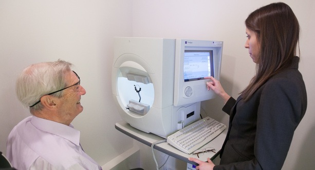 Kathryn Buchanan examining a patients visual field test for glaucoma using Humphrey HFA 2 Sita 24-2 test