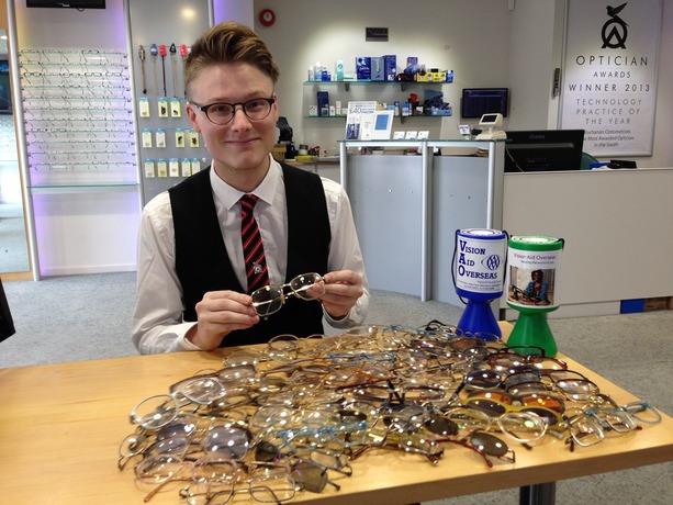 Sean Clarke collecting spectacles for Vision Aid Overseas at opticians Buchanan Optometrists, Kent